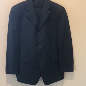 Handsome black suit with tone on tone stripe.